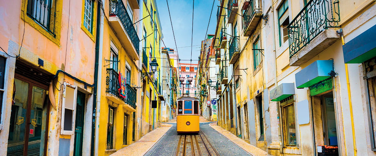 A bright yellow tram in Lisbon, Portugal